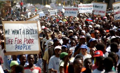 Anti-Aristide protesters march in Port-au-Prince, Haiti, Sunday, February 1st 2004