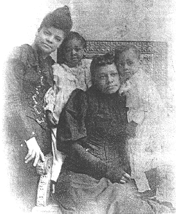 Ida B. Wells with Thomas Moss's family.
